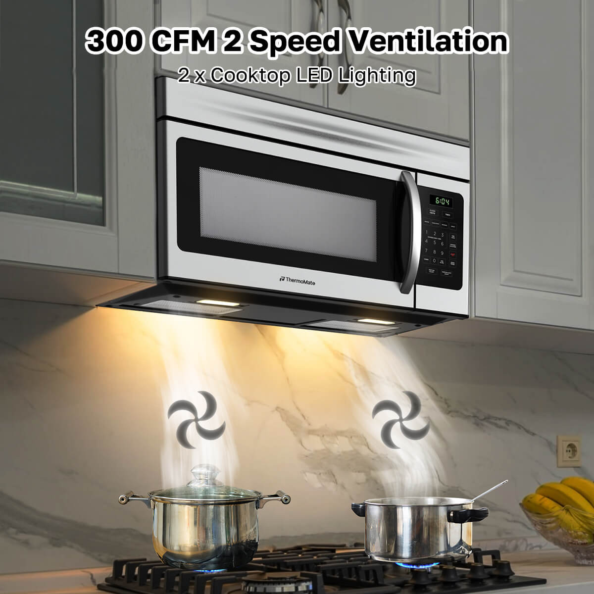 Kitchen with a microwave hood featuring 300 CFM 2-speed ventilation and LED lighting.