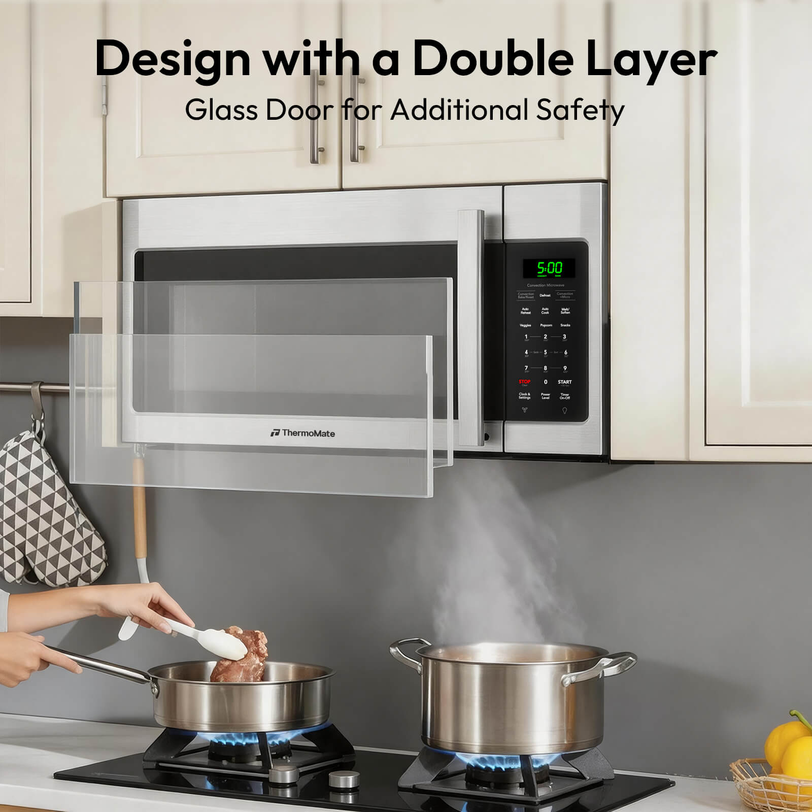 ThermoMate over-the-range microwave installed above cooktop with double layer glass door design for added safety